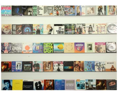 A collection of 1980's Pop Chart Hits 7" Singles. Includes artists: Madonna, Kate Bush, Michael Jackson and similar. Overall 