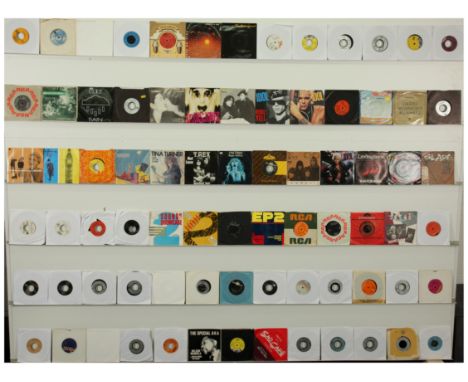 A collection of Mixed Rock 7" Singles to include; The Specials AKA, Electric Light Orchestra, Sweet, Dire Straits, Billy Idol