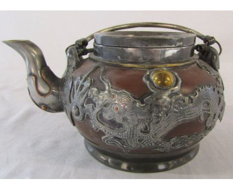 Chinese terracotta and pewter mounted ornate teapot