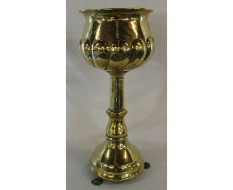 Large early 20th century English Arts & Crafts polished brass jardiniere, the bulbous planter with lobed body, the column bas