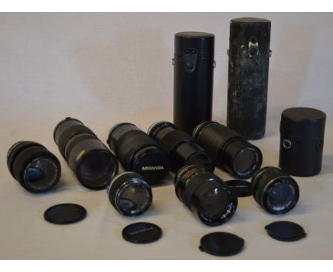 Quantity of camera lenses, mainly OM fit, including Olympus, Bell & Howell, Auto Optomax etc 