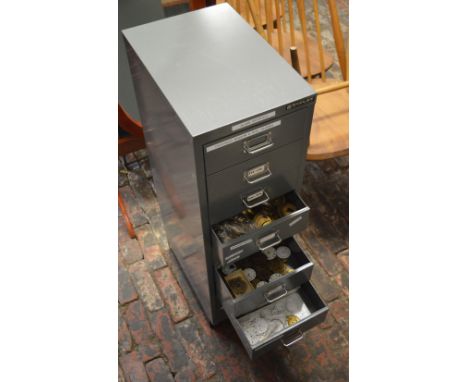 Large filing cabinet full of watchmakers parts including quantity of crystals, enamel dials, movement parts etc