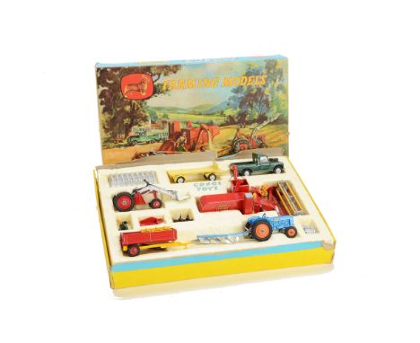 A Corgi Toys Gift Set 22 Farming Models, comprising 1111 Combine Harvester, 406 Land Rover, 51 Tipping Trailer, 101 Platform 