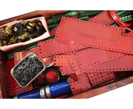 Loose Red & Green Meccano, circa 1950's including, pulleys, Bush Wheels, Disc Wheels, Chains, circular  girder, ball bearings