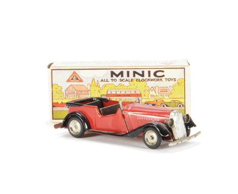 Tri-ang Minic Clockwork Tinplate 17M Vauxhall Tourer, in red and black, in original box, VG-E, box VG clockwork tested well a