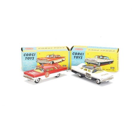 A Corgi Toys 482 Chevrolet Fire Chief, red over white body, blue light, grey aerial, round labels, spun hubs, 481 Chevrolet P
