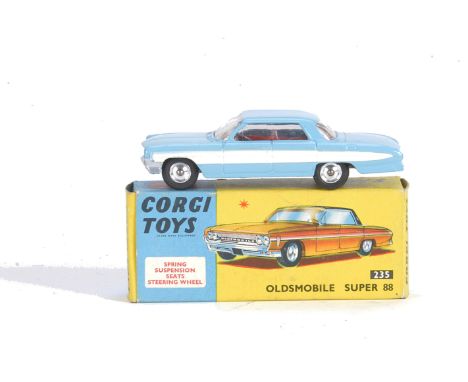 A Corgi Toys 235 Oldsmobile Super 88, light blue body, white side flash, red interior, spun hubs, in original box, E, a few m