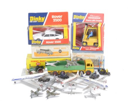 A Dinky Supertoys 563 Heavy Tractor, 532 Comet Wagon, 409 Bedford Articulated Lorry, 404 Fork Lift, 180 Rover 3500, in origin