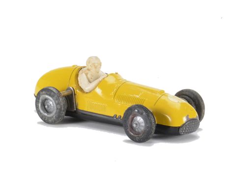 An unusual Lima 'Scalex' style plastic and tinplate F1 Racing Car, in yellow with plastic base, body and hubs, tinplate grill