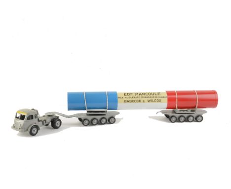 A CIJ No.3/75 Renault Nuclear Tractor Trailer, comprising grey diecast tractor unit, two tinplate trailers and blue/white/red