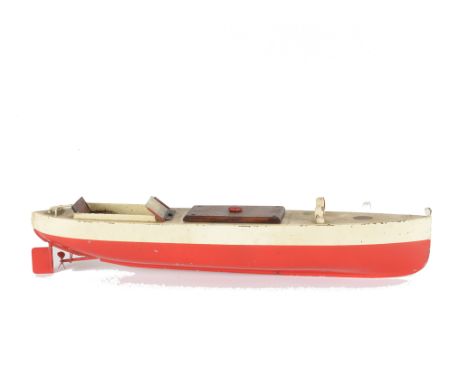 A Sutcliffe Meteor clockwork single screw Launch, in red and off white, with wooden deck cover and seat, original windscreen 