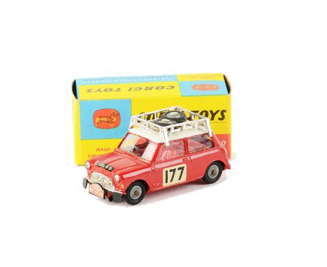 A Corgi Toys 339 Monte-Carlo BMC Mini Cooper S, red body, white roof, RN177, 2 spare wheels, red interior, cast hubs, in orig