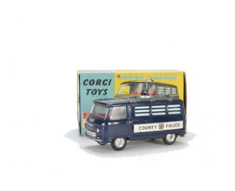 A Corgi Toys 464 Commer Police Van, dark blue body, 'County Police' decal, clear roof light, spun hubs, in original box with 