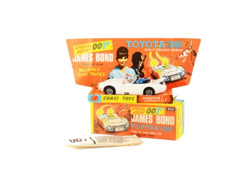 A Corgi Toys 336 James Bond's Toyota 2000 GT, white body, red aerial, 2 figures, rocket launchers in boot, in original box wi
