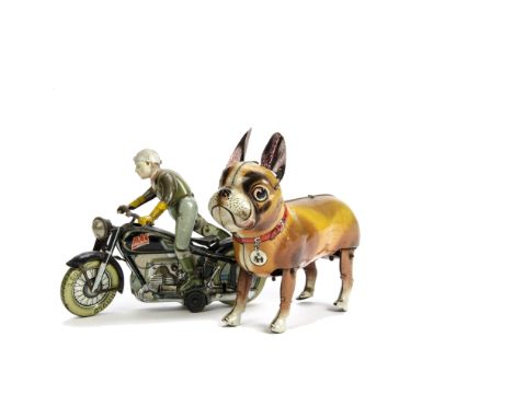An Arnold Tinplate Clockwork MAC 700 Motorcycle, black frame with detailed tin printed engine, balloon tyres, dismounting rid