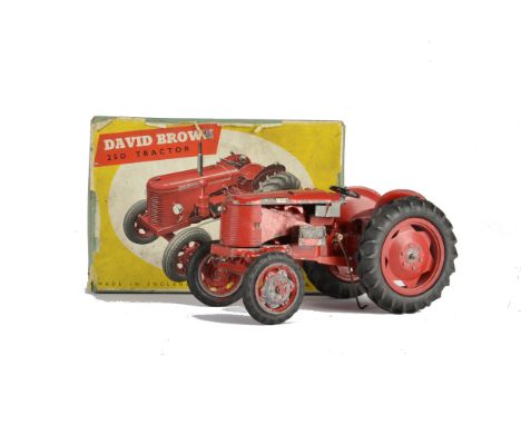 A Denzil Skinner David Brown Tractor,  in red with two Terry's Spanner and Exhaust pipe,  in original box, F, some damage and
