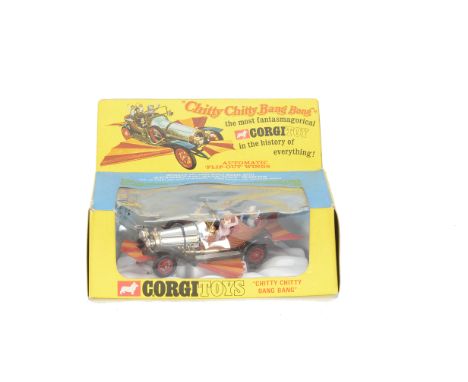 A Corgi Toys 266 Chitty Chitty Bang Bang, chrome, brown and red body, black chassis, retractable wings, four figures, in orig