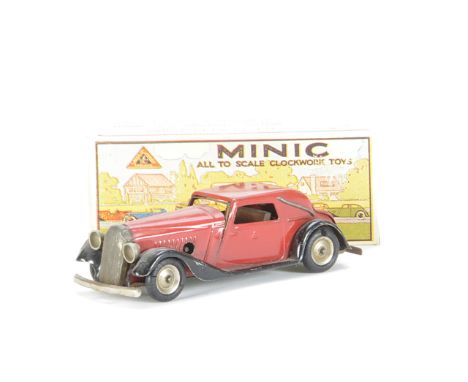 Tri-ang Minic Clockwork Tinplate 17M Vauxhall Tourer, in red and black, in original box, G, paint loss to front wheel arch, s
