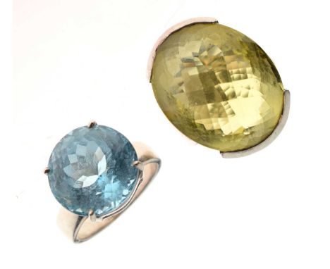 Lemon topaz silver dress ring, the oval briole cut stone measuring approximately 19mm x 22mm, stamped '925', size O, and a si
