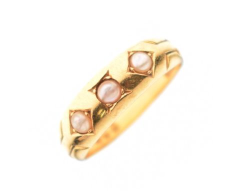 Late Victorian / Edwardian 18ct gold ring set three seed pearls, with cut out decoration to the shoulders, size J½, sponsor's