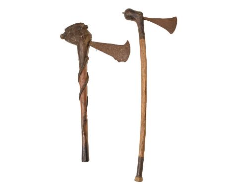 Rhodesian axe with carved figural head, the grip with two winding snakes, together with another Rhodesian axe, 56cm long and 