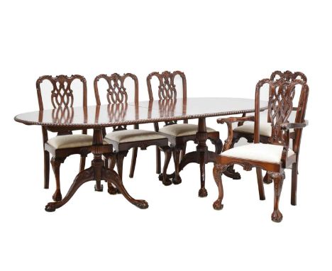 Reproduction mahogany dining suite consisting of a triple pedestal dining table, to seat ten, having a pair of D-shaped ends 