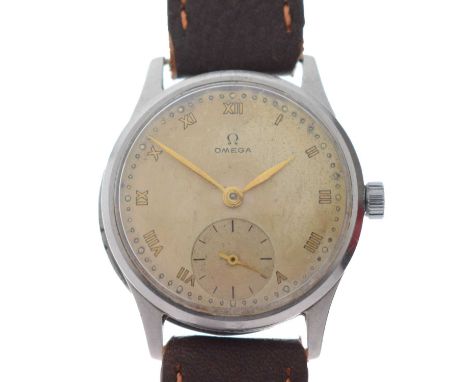 Omega - Gentleman's vintage wristwatch, the champagne dial with gilt Roman hour markers, seconds subsidiary, and gilt metal h