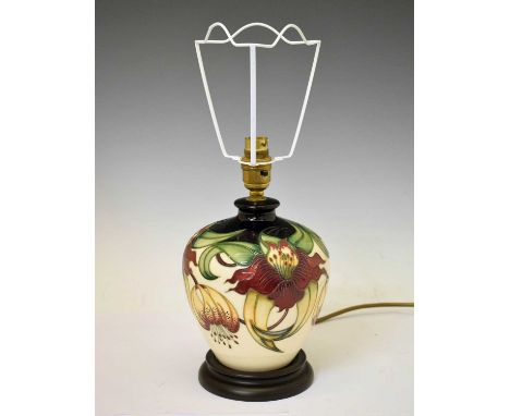 Moorcroft Pottery - 'Anna Lilly' pattern table lamp, mounted on turned wooden base, 21cm high (ex.fitting and shade)