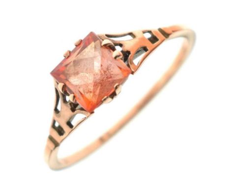 Early 20th century orange-coloured sapphire rose gold ring, the square stone measures 5.5mm x 5.5mm approx, claw set within p