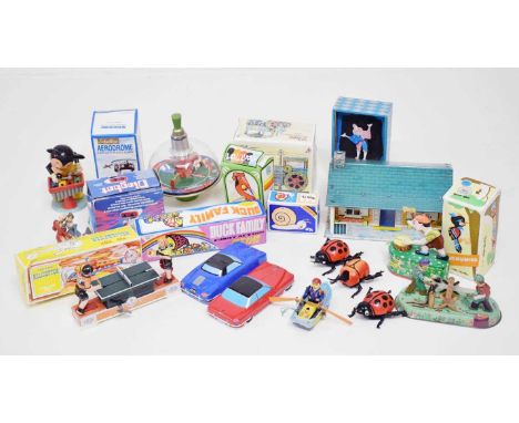 Collection of reproduction tinplate and clockwork toys to include; money box, lumberjacks, parrot, snail, Kovar Retro 'Road R