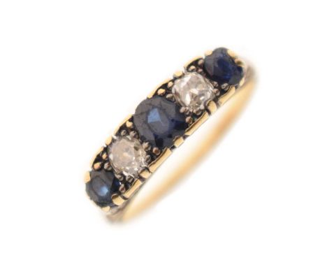 Sapphire and diamond five-stone ring, the two old cut diamonds between three sapphires, the yellow metal shank stamped '18ct'