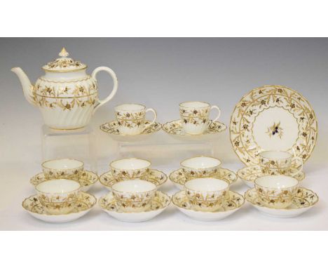 Late 18th century Worcester fluted part tea service, painted and gilded scrolling flowering foliage, comprising seven teabowl