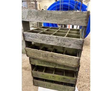 Two vintage wooden bottle crates marked Henekeys Ltd, Cobham, Surrey