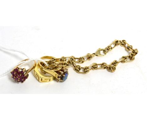 A bracelet with clasp stamped 9ct, two dress rings stamped 375 and 9 carat and another ring stamped 585Bracelet and two dress