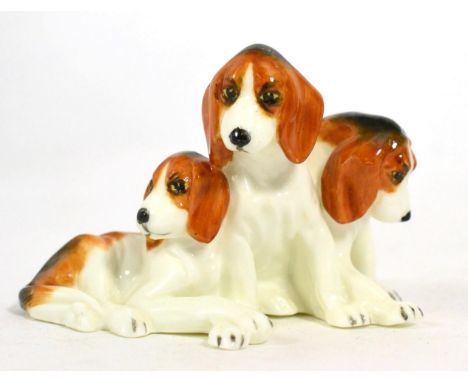 A Royal Worcester model of fox hounds, No. 3132