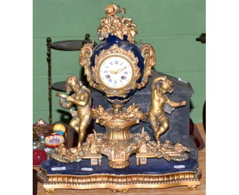 A 19th century gilt metal striking figural mantel clock with enamel dial and Roman numerals (a.f.) 