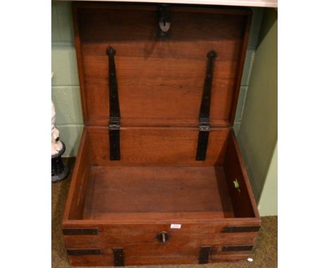 A metal bound teak trunk 