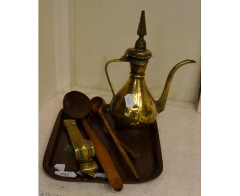 A 19th century glass walking stick trigger; a treen spoon; ladle and pastry wheel; Persian brass ewer and a Chinese brass pen