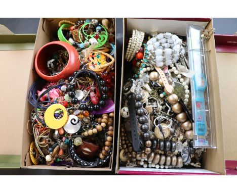 Two shoe boxes of assorted vintage costume jewellery to include necklaces, bracelets, watches etc