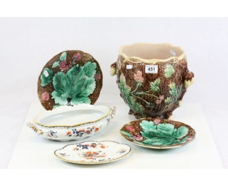 Two Majolica plates, a Majolica Jardiniere pot and a ceramic tureen with stand