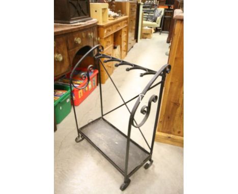 A metalwork stick / umbrella stand