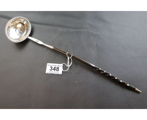 Georgian silver and horn twist handled punch ladle, engraved initials RW to bowl, hallmarks indistinct, length approximately 