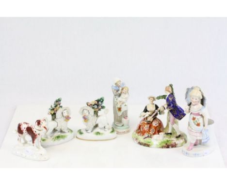 Group of mixed ceramics to include a pair of Poodles with baskets in their mouths, a couple with female playing guitar and a 