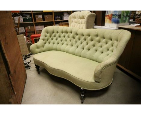 19th century Salon Settee / Sofa with Button Back and raised on bulbous legs and castors