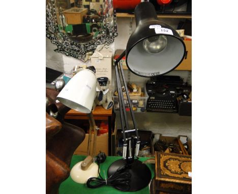 A black angle-poise lamp and a smaller similar lamp.