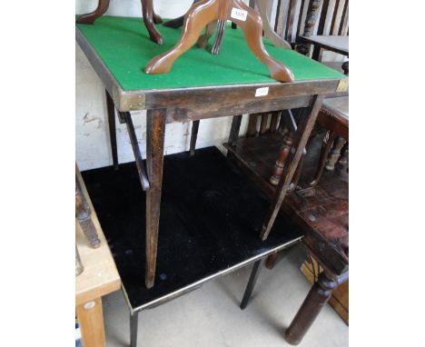 A black lacquered and chinoiserie decorated folding card table and another.