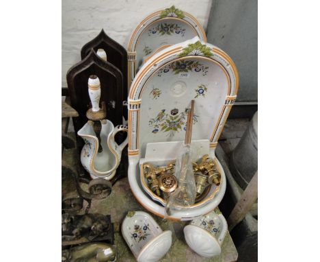 A pair of Italian ceramic wall mounted wash basins, soap dishes, etc.