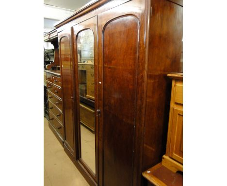 A Victorian mahogany 3-door compactum wardrobe, width 6'4".