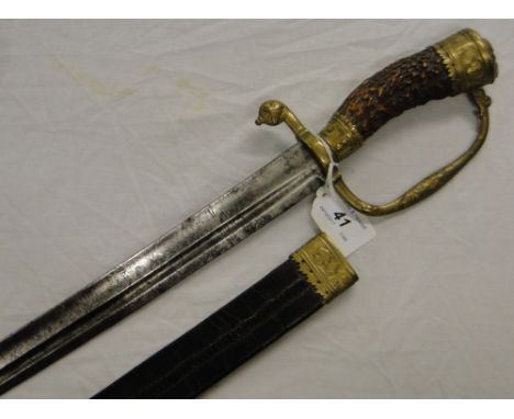 A 19th century English hunting sword with horn handle, leather scabbard and brass mounts.