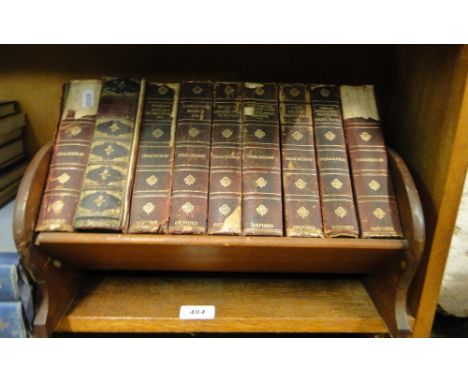 A set of Thackeray books in book trough.